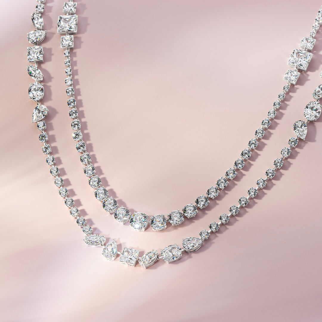 Laureate: Silver rhodium plated multi-shaped princess and round CZ, 32 1/8" long necklace