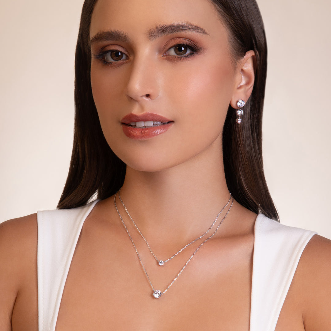 100 Cuts: Silver rhodium plated 8 mm round cut 100 facet CZ solitaire pendant with 16" necklace