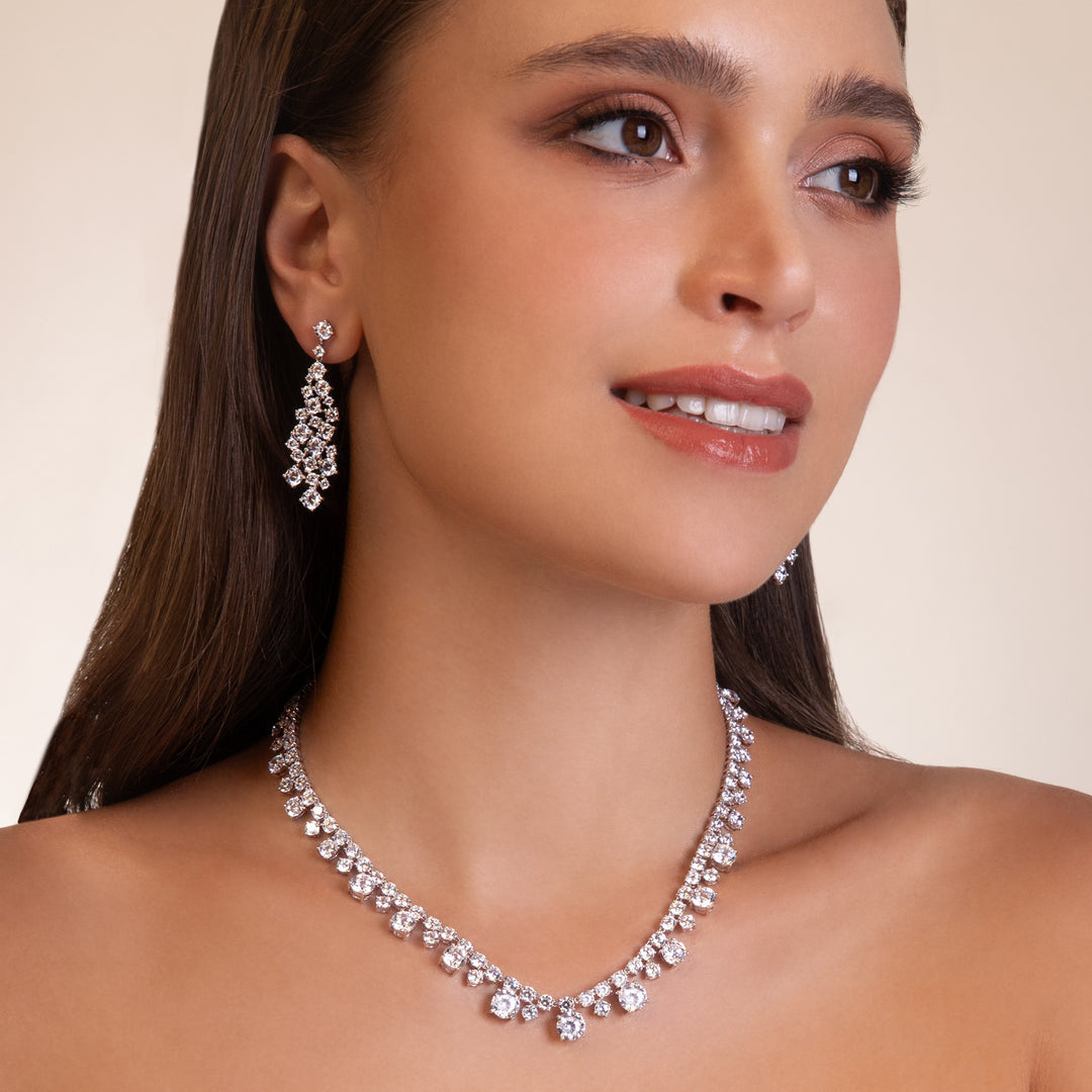 100 Cuts: Silver rhodium plated round cut 100 facet CZ with 16" riviere tennis necklace