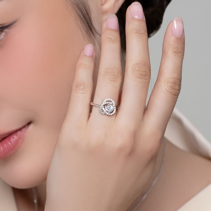 100 Cuts: Silver rhodium plated 5 mm 100 facets CZ crossover halo ring