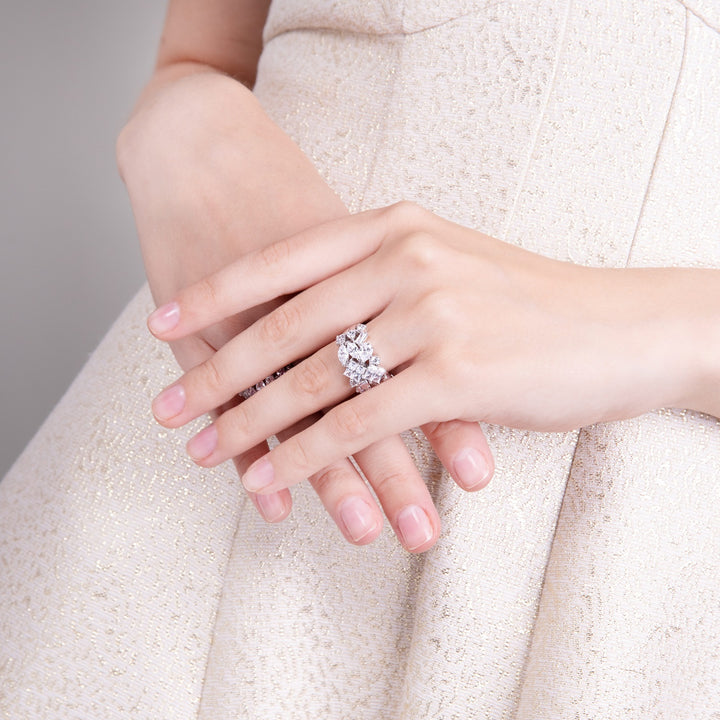 Laureate: Silver rhodium plated multi-shaped pear cut CZ eternity band ring