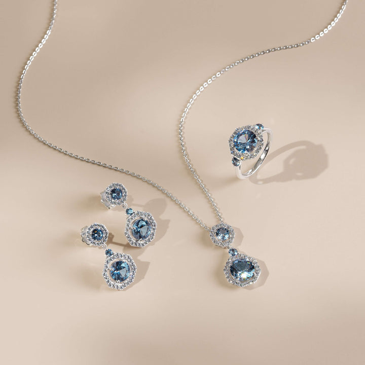 225E0284-01-Decorum-Silver-Rhodium-Plated-Synthetic-Aquamarine-Halo-Dangle-Earrings