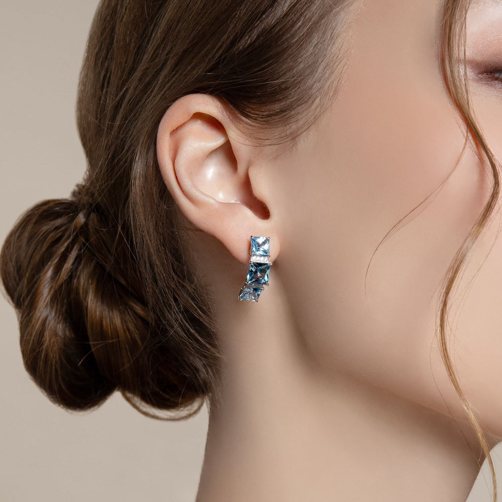 225E0286-01-Decorum-Silver-Rhodium-Plated-Synthetic-Aquamarine-Princess-Cut-Stud-Earrings