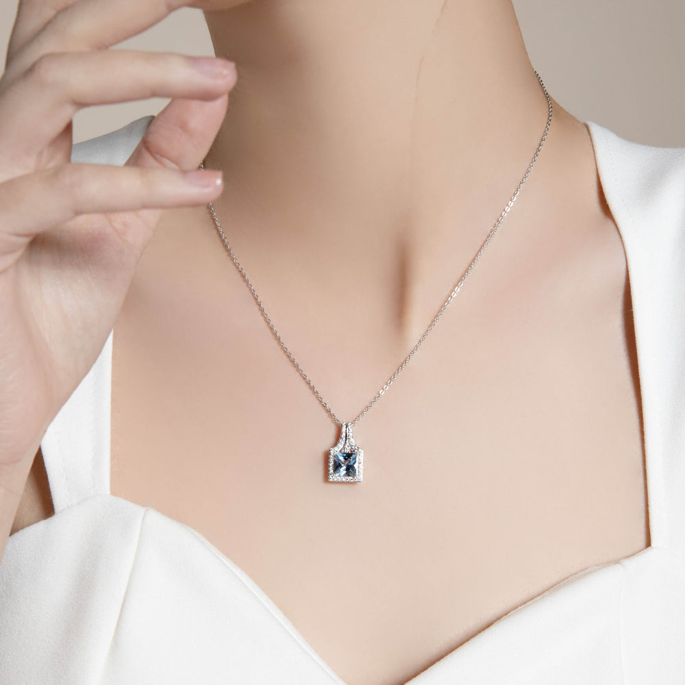 225N0185-01-Decorum-Silver-Rhodium-Plated-Synthetic-Aquamarine-Princess-Cut-Pendant-Necklace