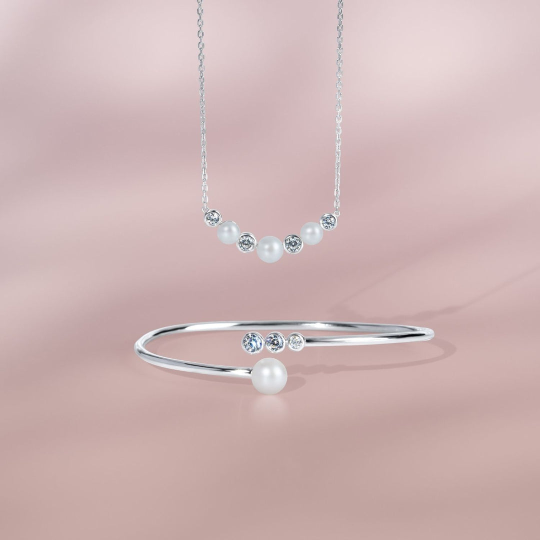 Classic Pearl: Silver Rhodium Round Cut CZ & Pearl Cluster Necklace