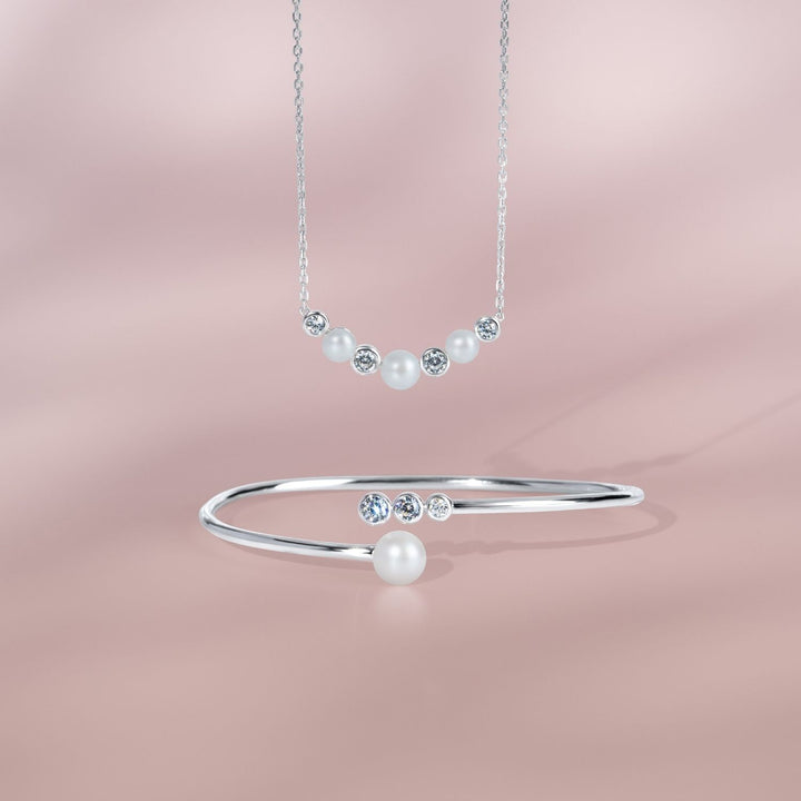 Classic Pearl: Silver Rhodium Round Cut CZ & Pearl Cluster Necklace