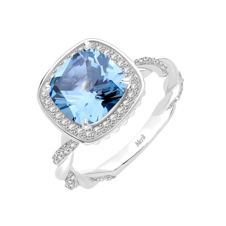 Decorum: Sterling Silver Rhodium Plated Synthetic Aquamarine Spinel Cushion and CZ Ring