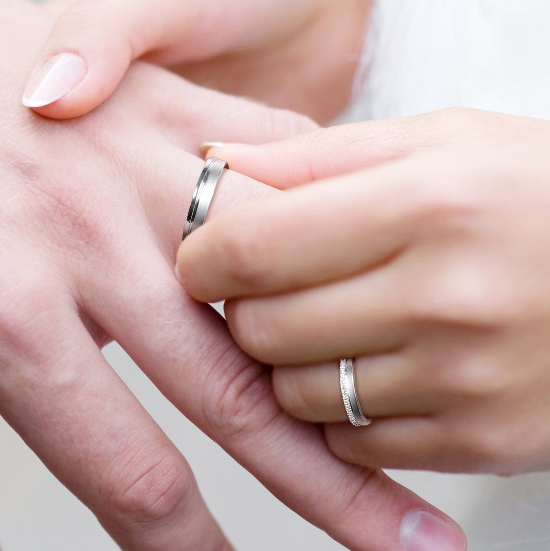 Couple Rings: Silver rhodium plated with 1.1 mm CZ  two line band ring