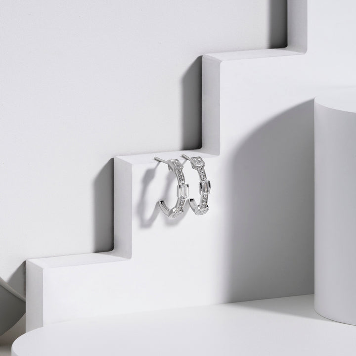 221E0452-01_Quadri_925_Sterling_silver_baguette_channel_and_prong_set_half_hoops_cubic_zirconia_stud_earrings,_21.26_mm.