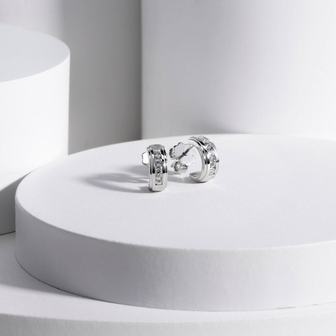 221E0454-01_Quadri_925_Sterling_silver_round_and_baguette_channel_set_half_hoops_cubic_zirconia_stud_earrings,_11.52_mm.