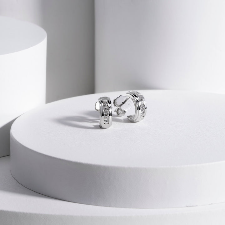 221E0454-01_Quadri_925_Sterling_silver_round_and_baguette_channel_set_half_hoops_cubic_zirconia_stud_earrings,_11.52_mm.