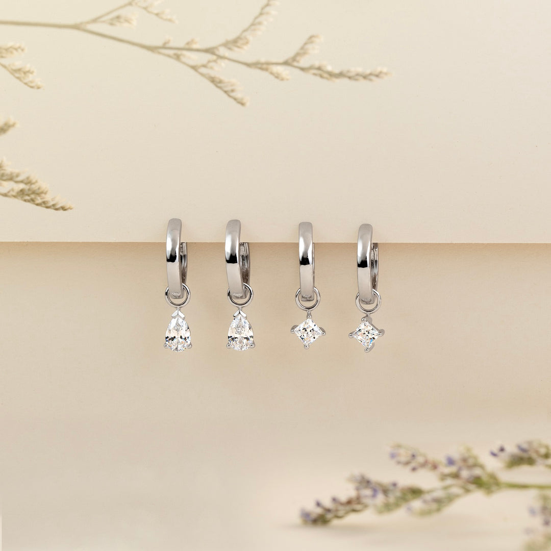 221E0553-01-Merii-Silver-CZ-pear-drop-huggie-earrings