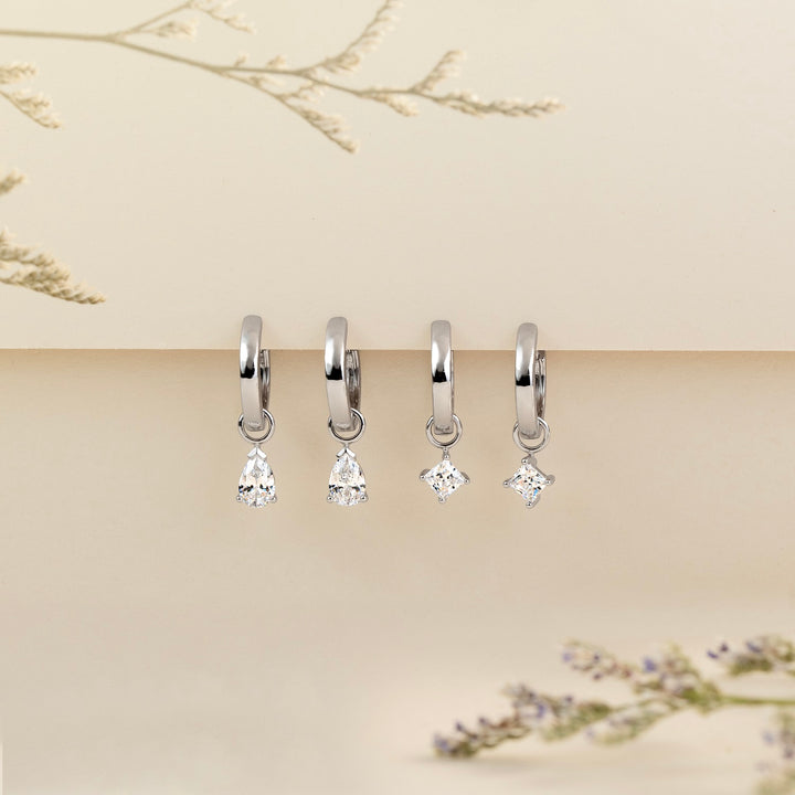221E0553-01-Merii-Silver-CZ-pear-drop-huggie-earrings