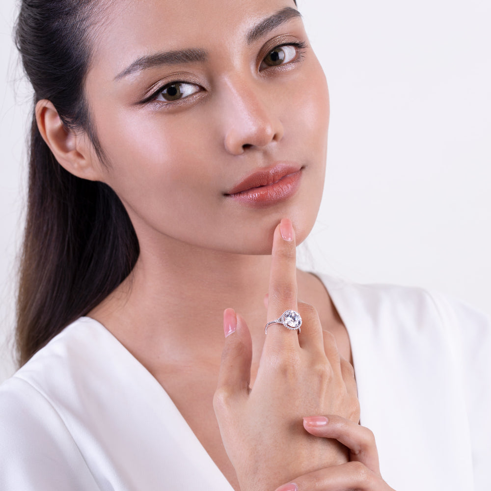 221R0089-01_Silver_100_facts_CZ_shoulder_set_halo_ring