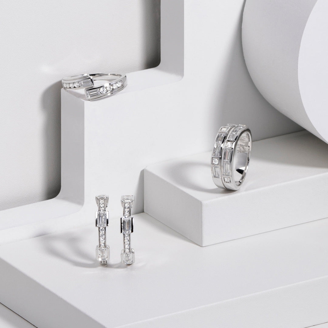 221E0452-01_Quadri_925_Sterling_silver_baguette_channel_and_prong_set_half_hoops_cubic_zirconia_stud_earrings,_21.26_mm.