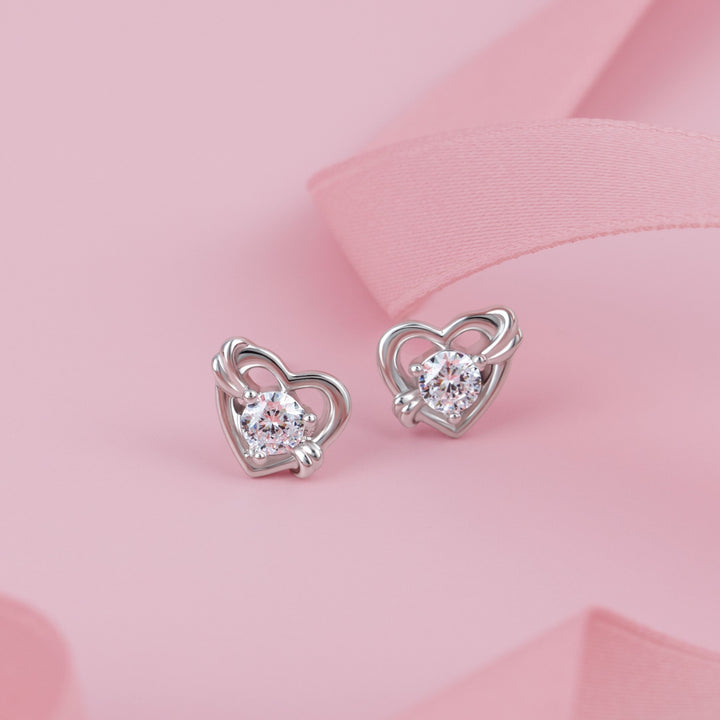 To Have and To Hold: Rhodium Plated 925 Sterling Silver Heart Earrings with Round Cut Cubic Zirconia