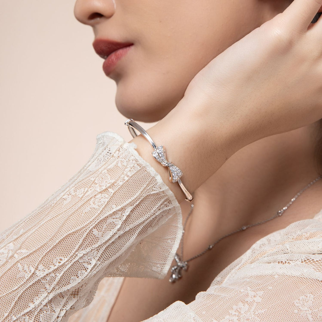 Ballerina: Sterling Silver Rhodium Plated CZ Bow Bangle