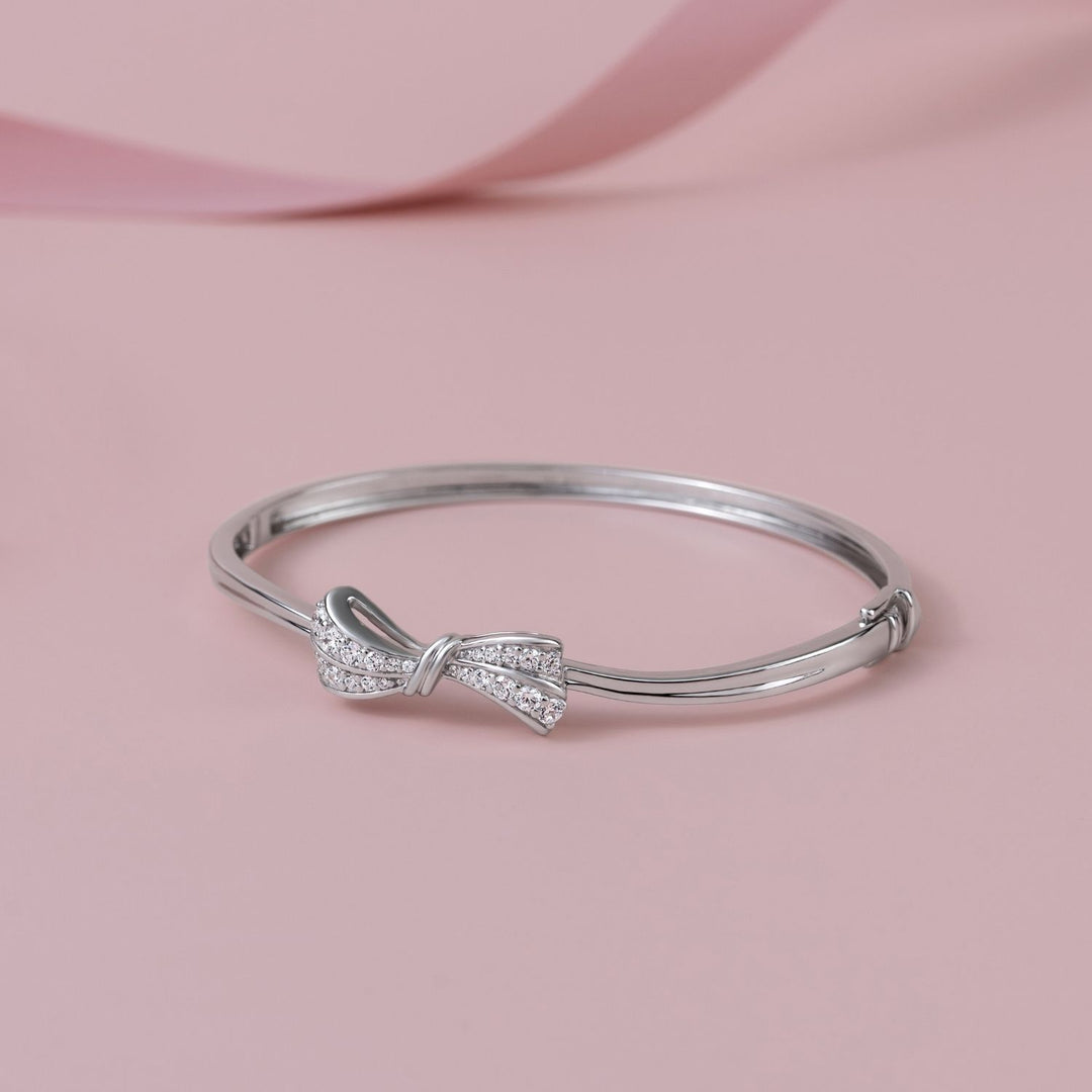 Ballerina: Sterling Silver Rhodium Plated CZ Bow Bangle
