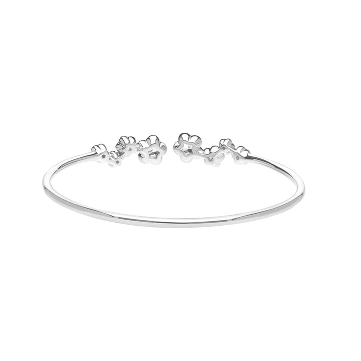 Forget Me Not: Silver rhodium plated with CZ flower bangle
