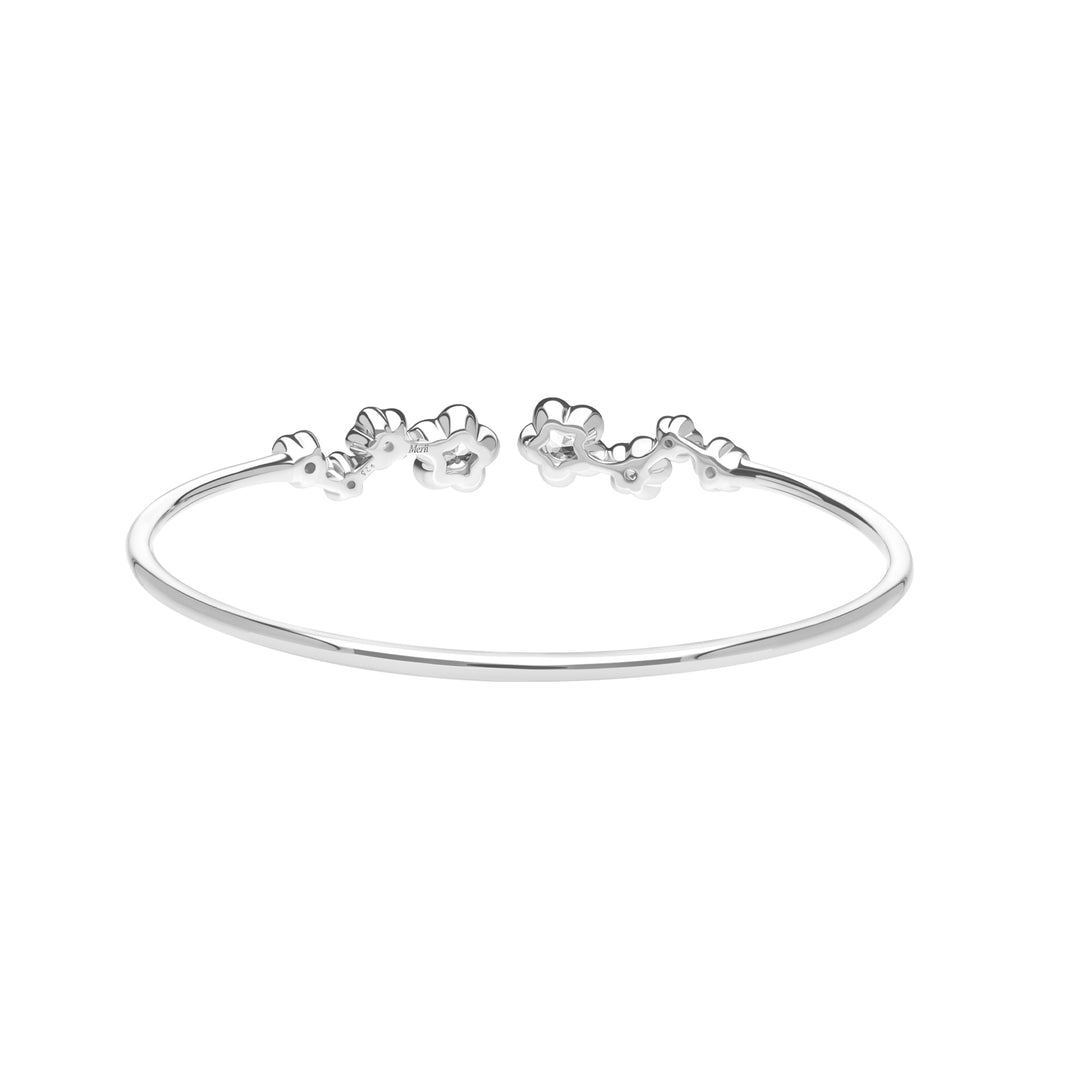 Forget Me Not: Silver rhodium plated with CZ flower bangle