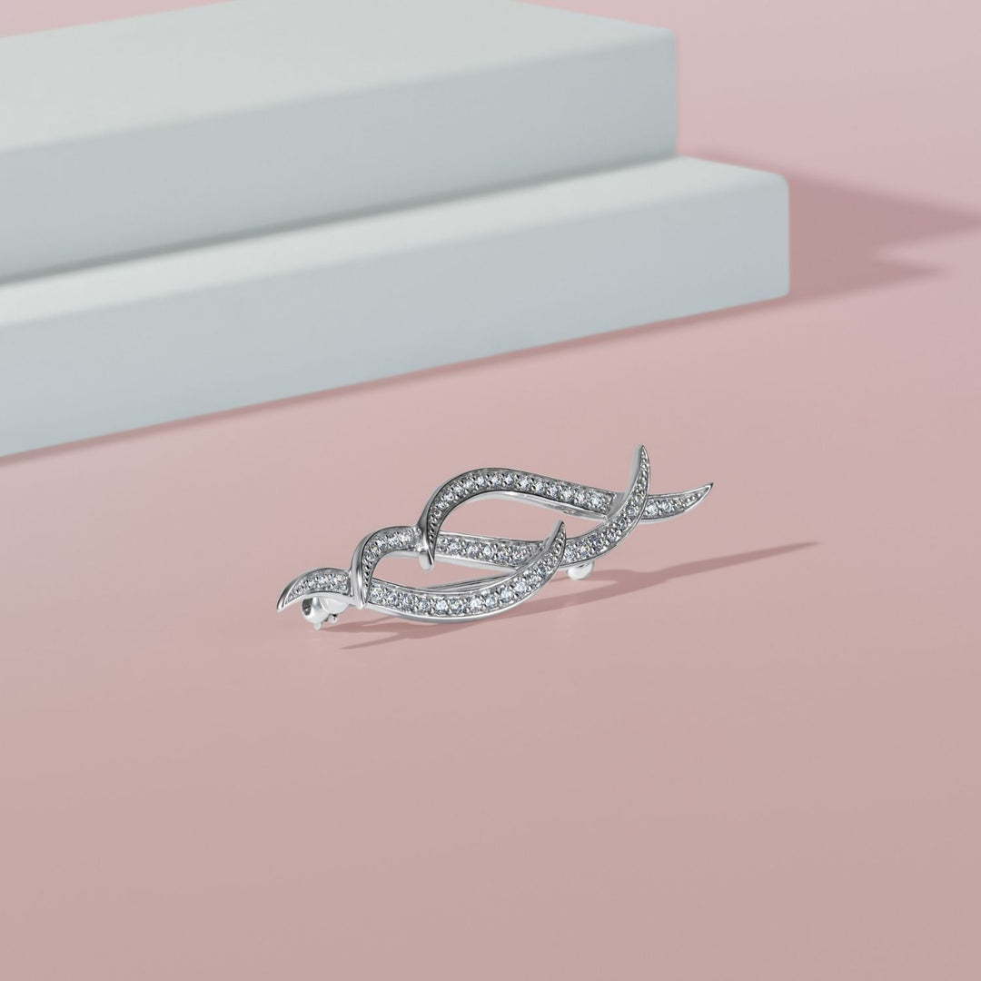 Classic: Silver Rhodium Flowing CZ Ribbon Brooch