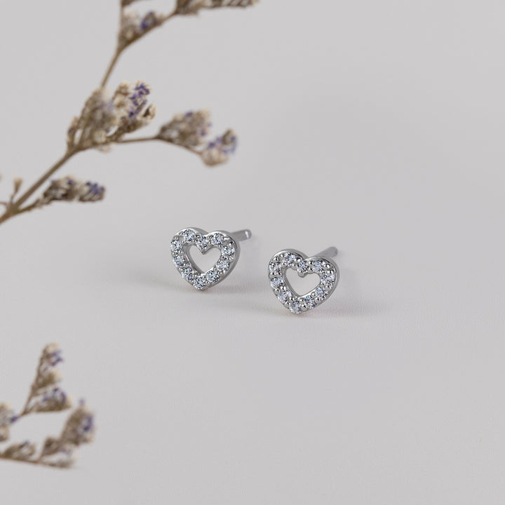 221E0555-01-Merii-Silver-CZ-hollow-heart-stud-earrings