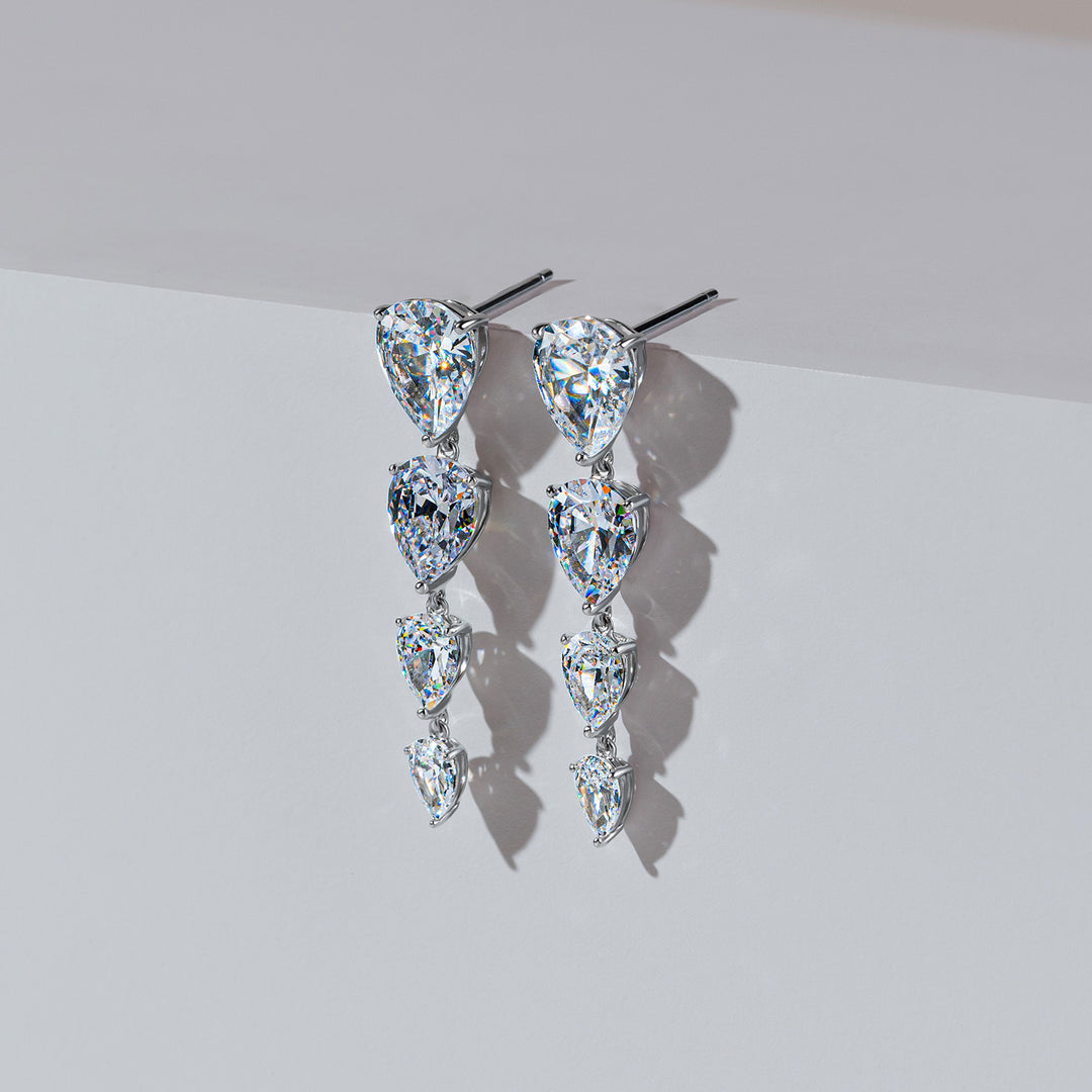 100 Cuts: Silver rhodium plated pear cut CZ drop earrings