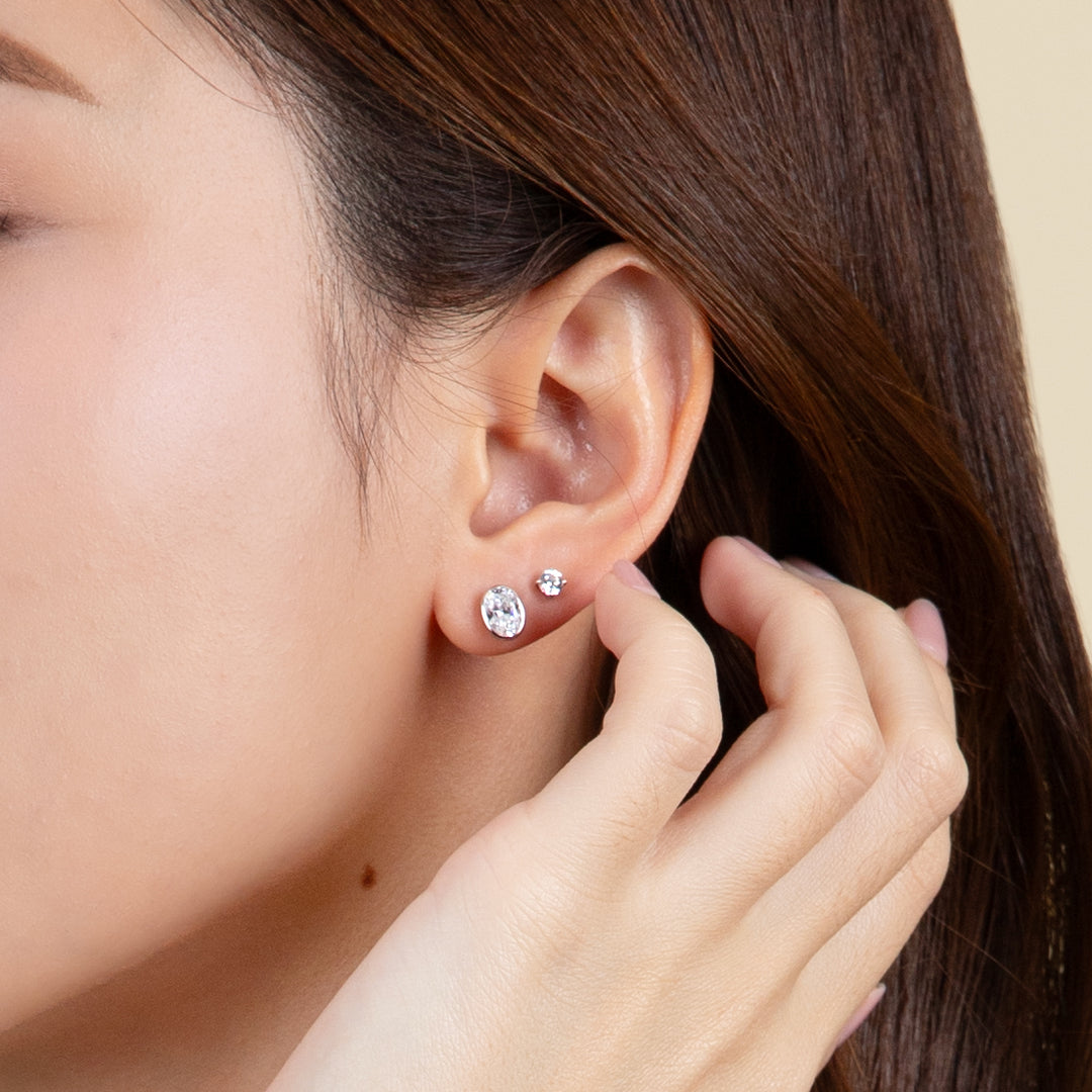 Little piece of me: Silver Rhodium Plated with Oval CZ Bezel Set Stud Earrings