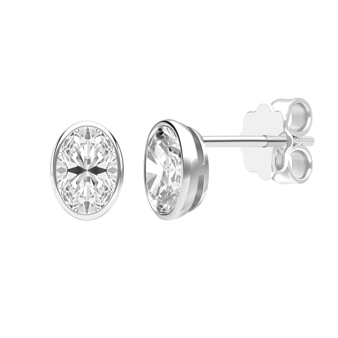 Little piece of me: Silver Rhodium Plated with Oval CZ Bezel Set Stud Earrings