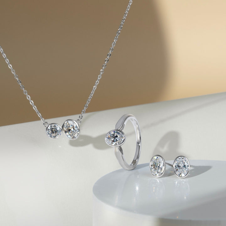 Little piece of me: Silver Rhodium Plated with Oval CZ Bezel Set Stud Earrings