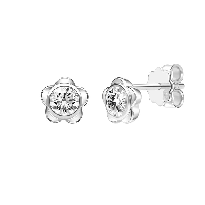 Forget Me Not: Silver rhodium plated 4.25 mm round cut CZ flowers stud earrings