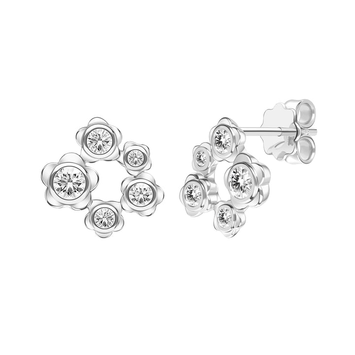 Forget Me Not: Silver rhodium plated 3.25 mm round cut CZ flowers stud earrings
