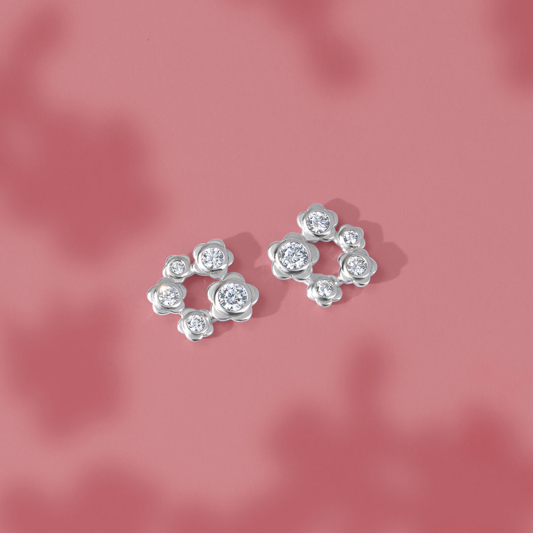 Forget Me Not: Silver rhodium plated 3.25 mm round cut CZ flowers stud earrings