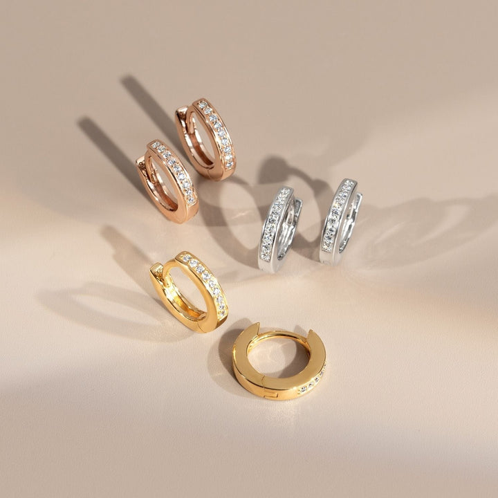 221E3514-01-Little-Piece-of-Me-23K-Gold-Plated-Silver-Huggie-Earrings-with-CZ