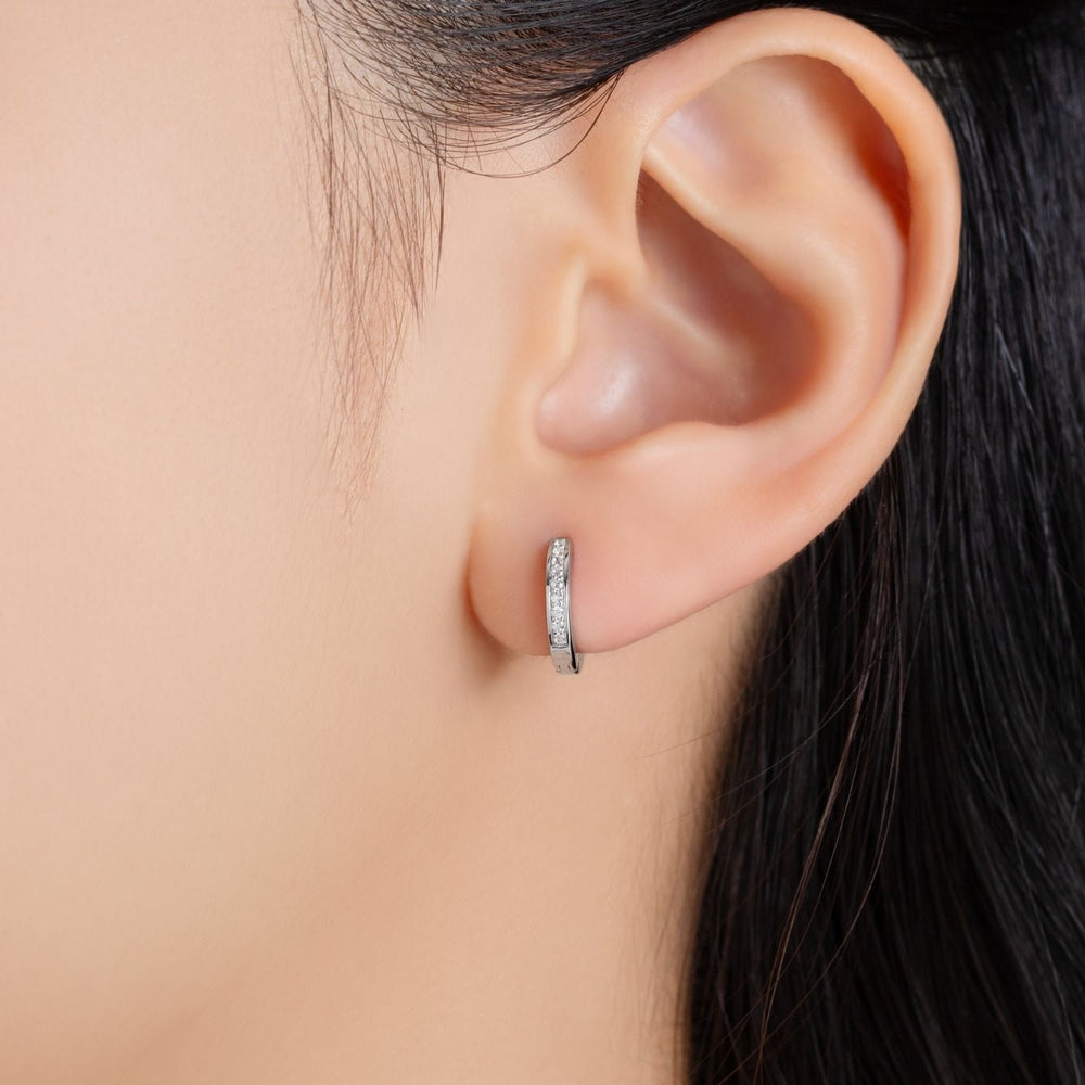 221E3515-01-Little-Piece-of-Me-Silver-Rhodium-Huggie-Earrings-with-CZ