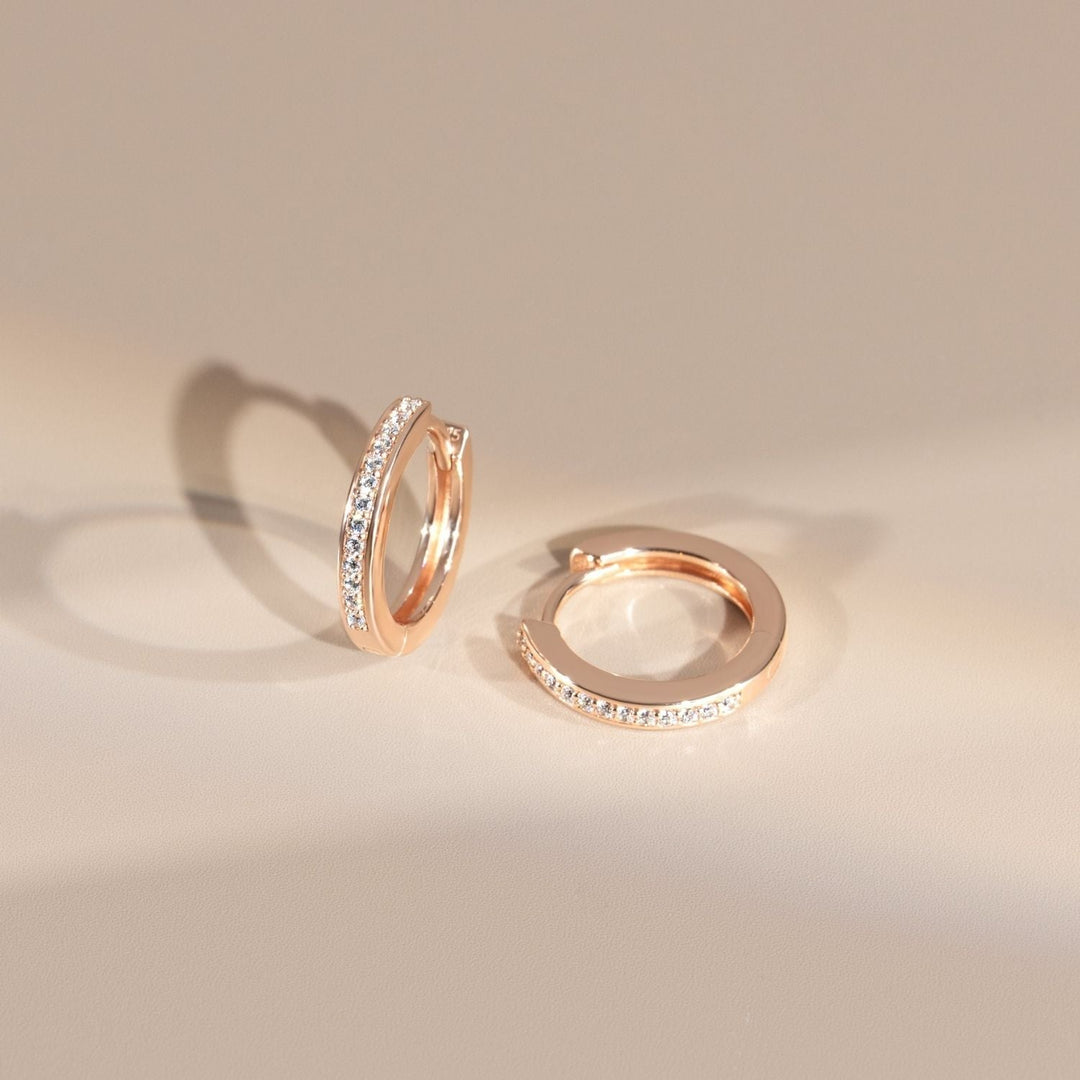 221E3516-01-Little-Piece-of-Me-Rose-Gold-Plated-Silver-Huggie-Earrings-with-CZ