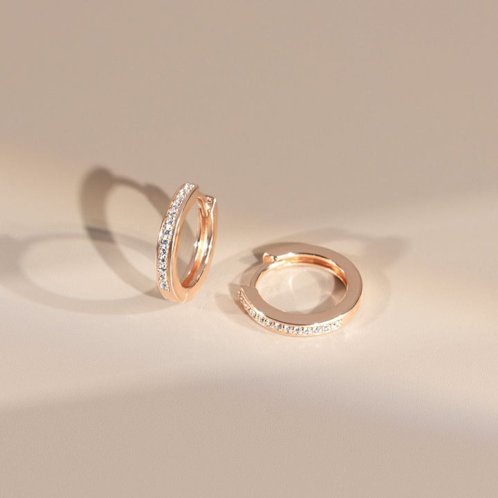 221E3516-01-Little-Piece-of-Me-Rose-Gold-Plated-Silver-Huggie-Earrings-with-CZ