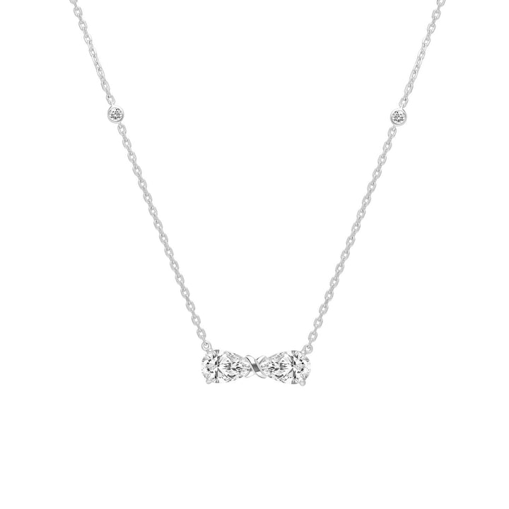 Ballerina: Sterling Silver Rhodium Plated CZ Pear Cut Infinity Bow Necklace