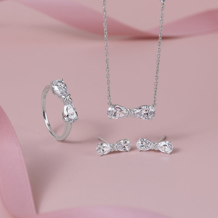 Ballerina: Sterling Silver Rhodium Plated CZ Pear Cut Infinity Bow Necklace