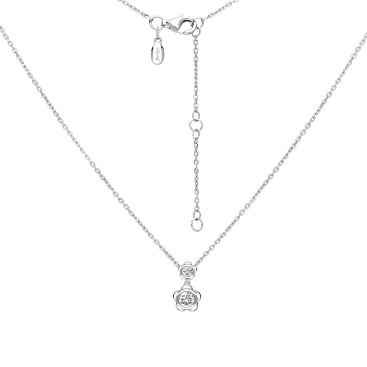 Forget Me Not: Silver rhodium plated 4.25 mm round cut CZ flower pendant with 16" chain necklace