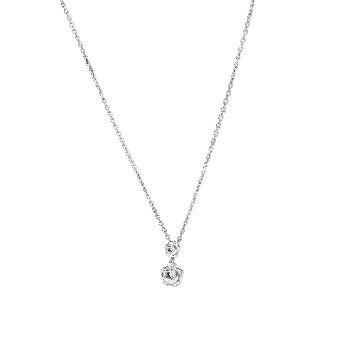 Forget Me Not: Silver rhodium plated 4.25 mm round cut CZ flower pendant with 16" chain necklace
