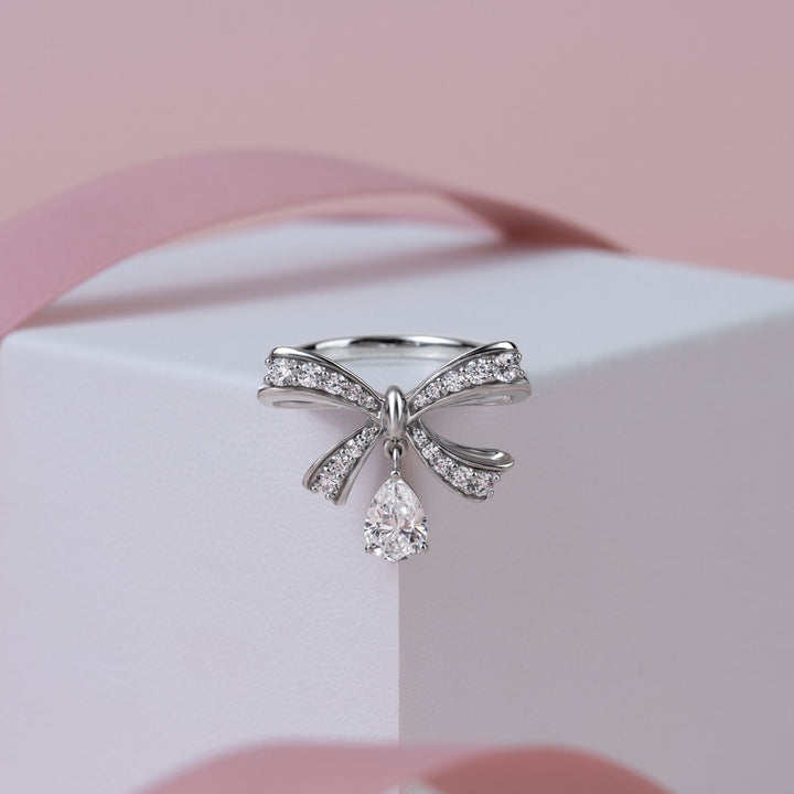 Ballerina: Sterling Silver Rhodium Plated Pear Cut CZ Bow Ring