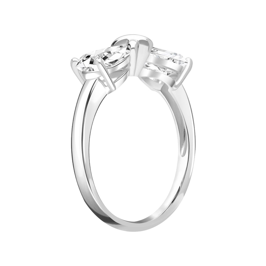 Ballerina: Sterling Silver Rhodium Plated CZ Pear Cut Infinity Bow Ring