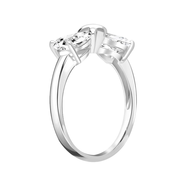 Ballerina: Sterling Silver Rhodium Plated CZ Pear Cut Infinity Bow Ring