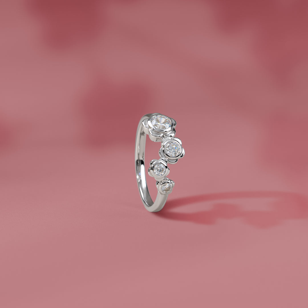 Forget Me Not: Silver rhodium plated 4.25 mm round cut CZ flower ring