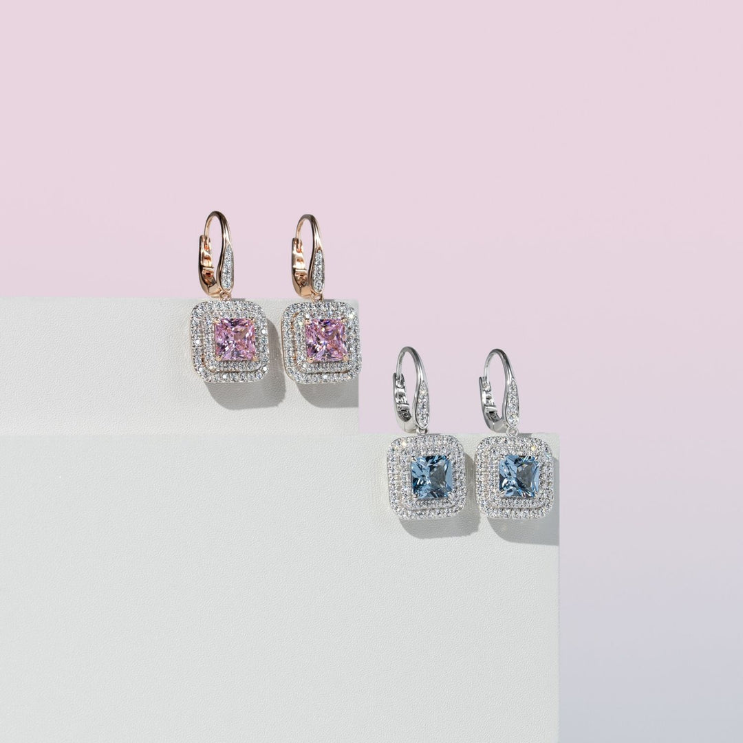 Decorum: ต่างหูเงินประดับ Synthetic Aquamarine Spinel ทรง Radiant Cut ล้อมเพชร CZ