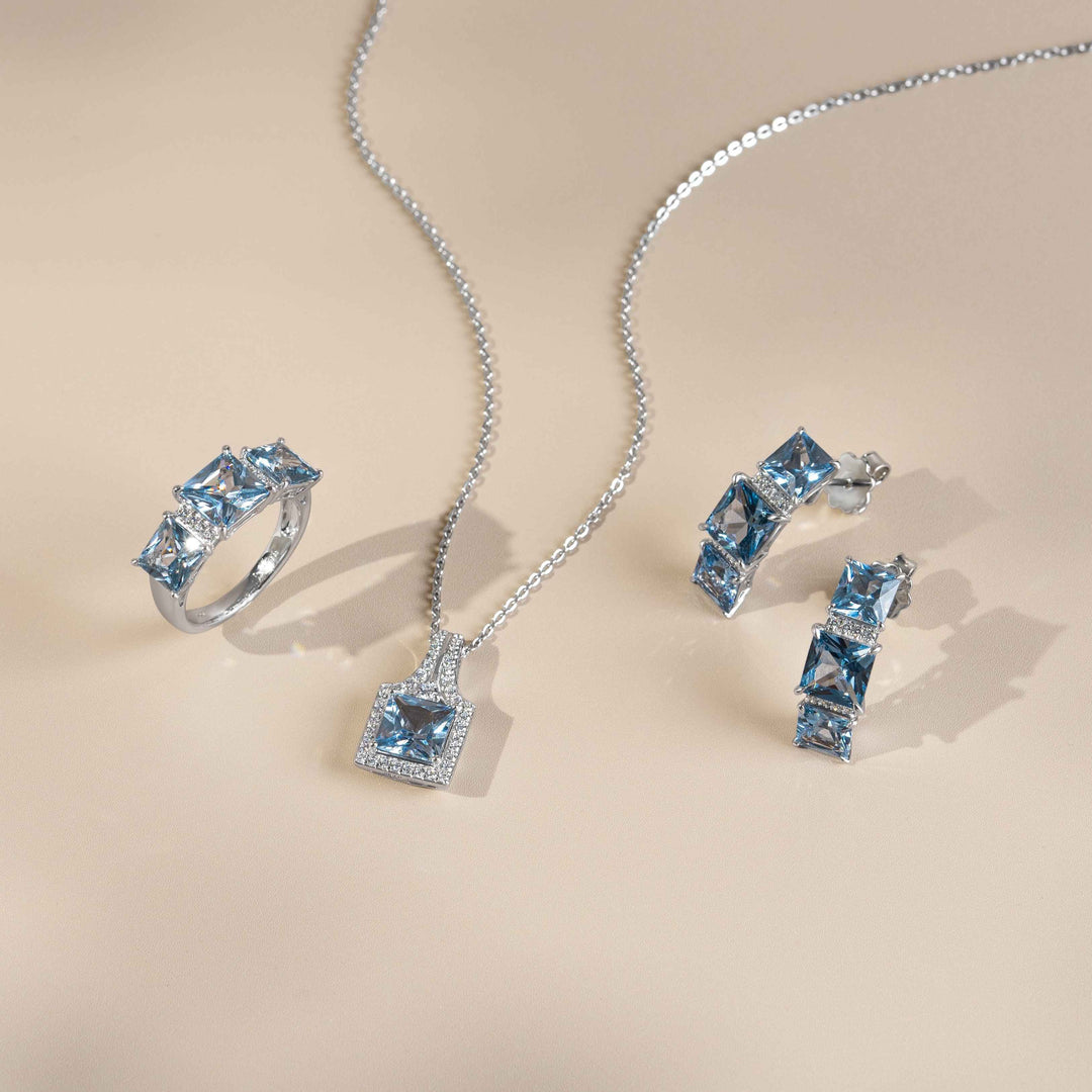 Decorum: Silver Rhodium Plated Synthetic Aquamarine Princess Cut Ring