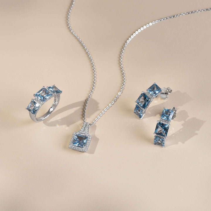 Decorum: Silver Rhodium Plated Synthetic Aquamarine Princess Cut Ring