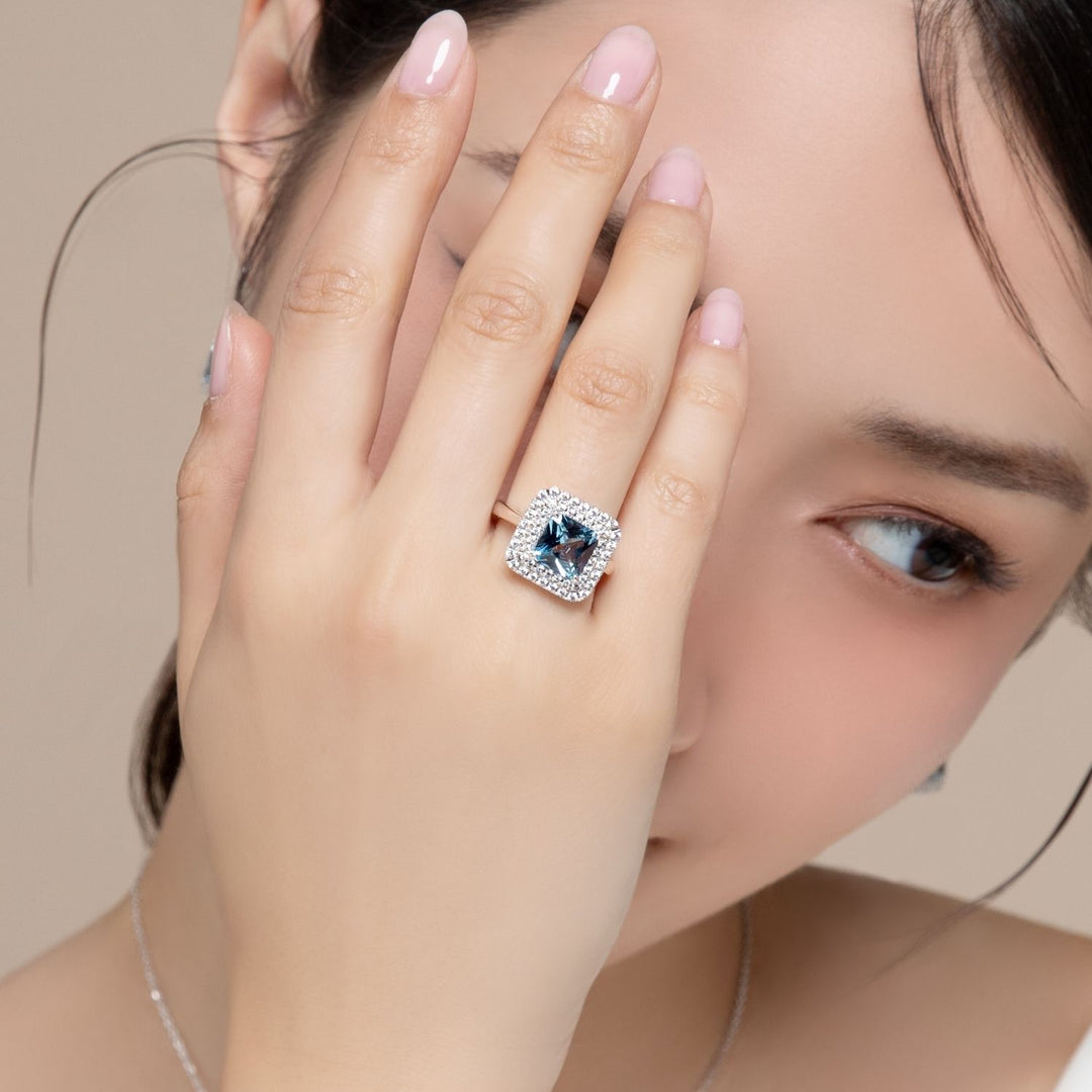 Decorum: Sterling Silver Rhodium Plated Synthetic Aquamarine Spinel Square Cut and Double CZ Halo Ring