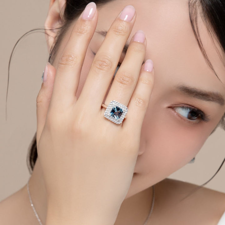 Decorum: Sterling Silver Rhodium Plated Synthetic Aquamarine Spinel Square Cut and Double CZ Halo Ring
